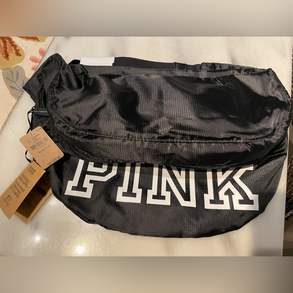 Pink convertible campus duffel. Black with White writing, Tags attached! New